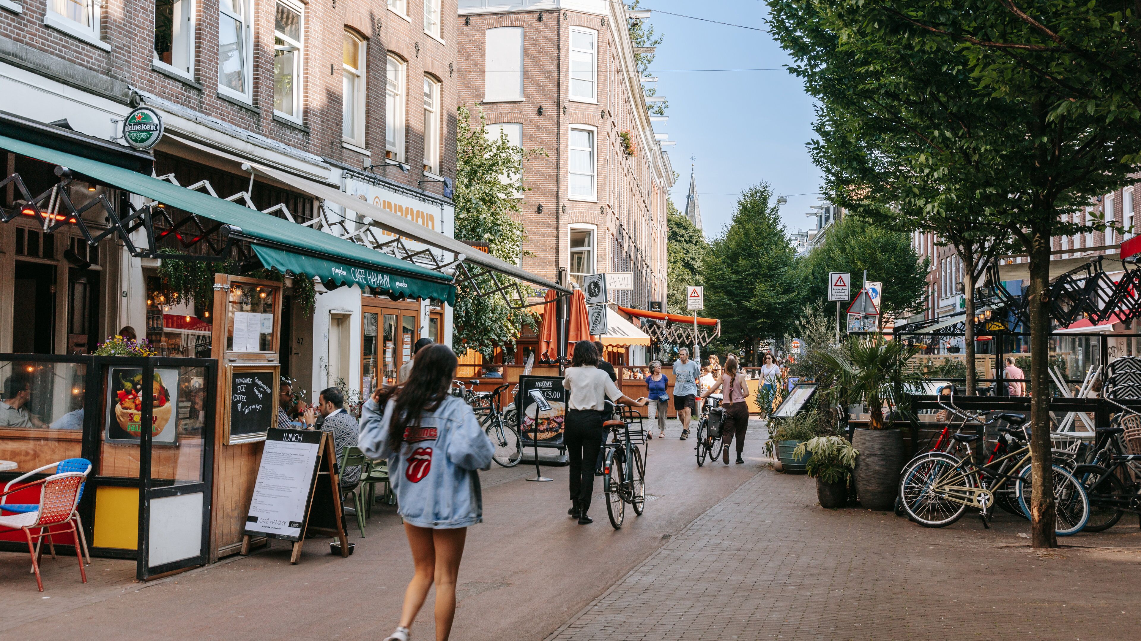 De Pijp featuring street scenes as well as an individual femail