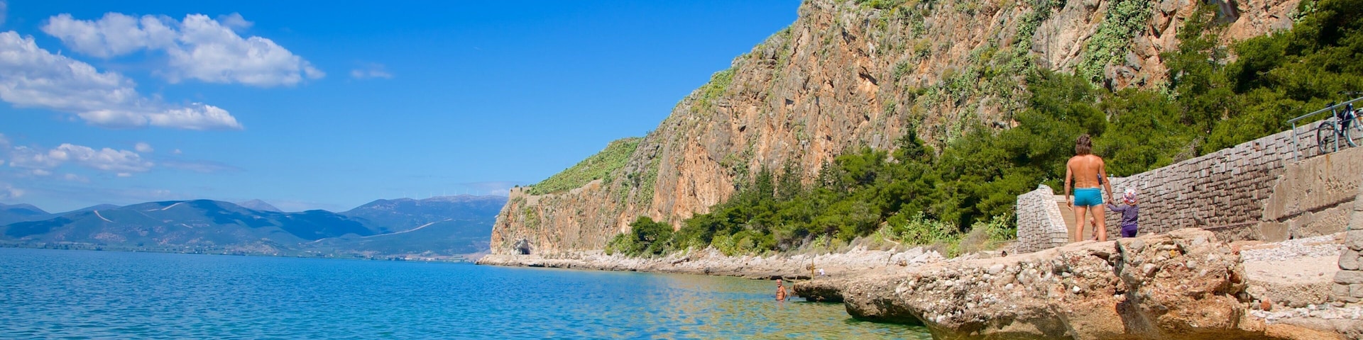 Nafplio City Centre featuring a pebble beach and rugged coastline