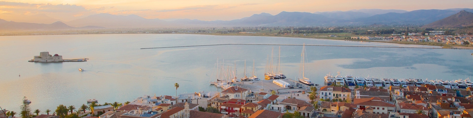 Nafplio which includes a coastal town, a marina and heritage architecture