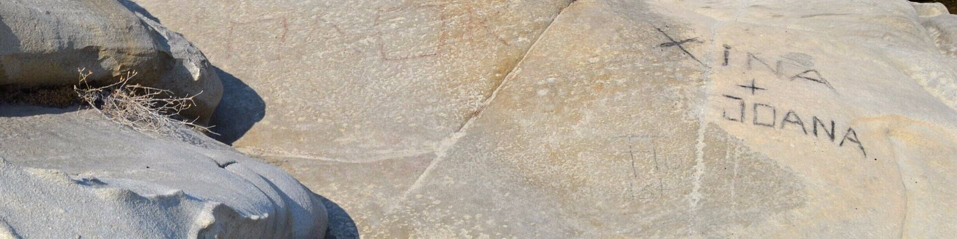 Pebbly beach nearby Vourvourou with a view of the Athos peninsula.