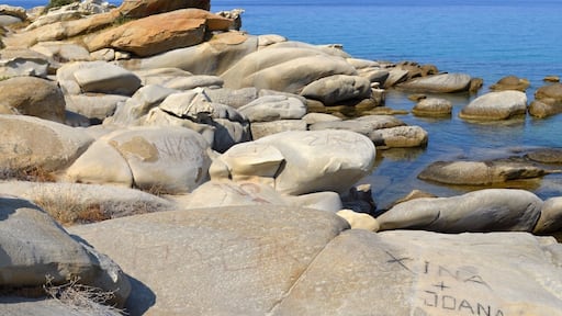 Pebbly beach nearby Vourvourou with a view of the Athos peninsula.