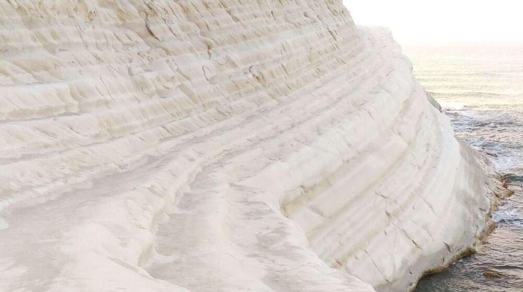 One of the most unusual beaches you'll see! Located in the southern coast of Sicily near town Porto Empedocle this beach features white rocky cliff in the form of "stair" which you can climb. Come early to enjoy it all for yourself! #EndlessSummer #Italy #Sicily