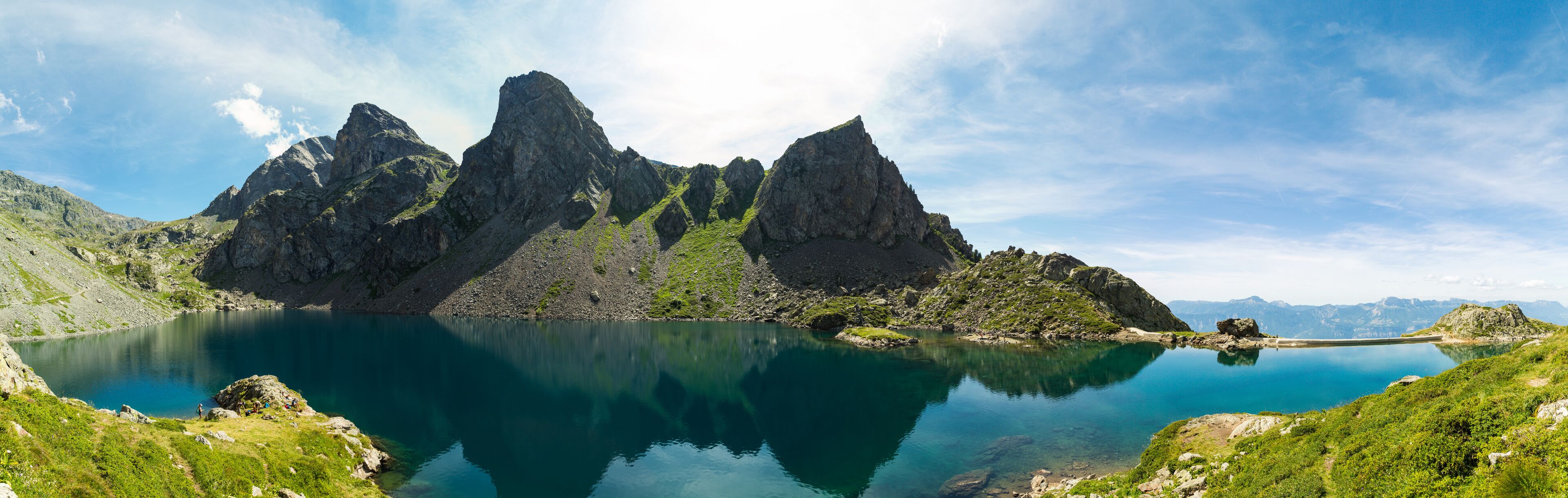 A mountain lake with rocky peaks and clear water.