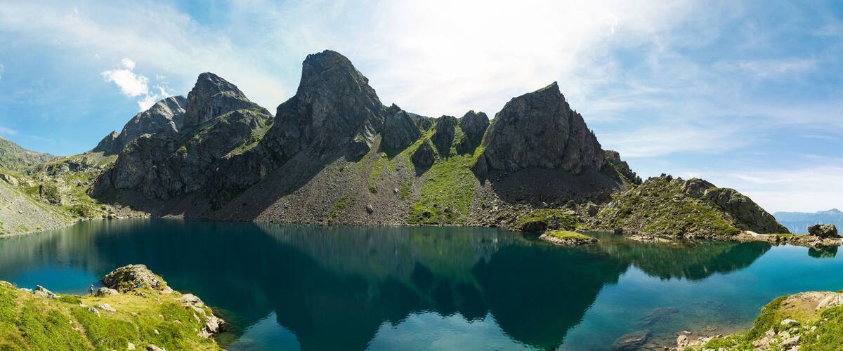 A mountain lake with rocky peaks and clear water.