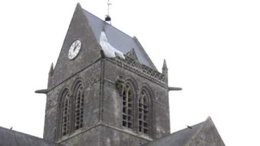 On D-Day, John M.Steele, one of the mortar platoon of the 505 PIR of the US 82nd Airborne had his chute snag on the church tower as he descended. Here he hung during the battle, watching helplessly as his colleagues fought below. This scene was famously reenacted in the film "The Longest Day", and a manequin now hangs from the church in Ste Mere Eglise depicting the event (do you see him?)