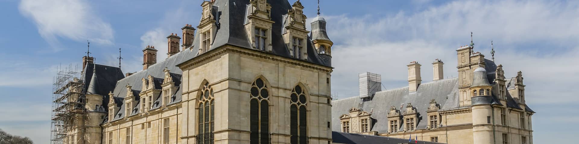 Architectural fragments of Cheteau Ecouen - historical chateau in city of Ecouen, north of Paris, France. Chateau built in 1538 – 1550.