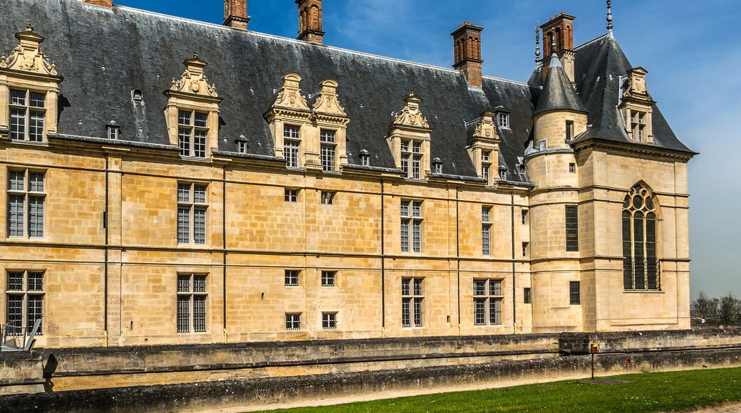 Architectural fragments of Cheteau Ecouen - historical chateau in city of Ecouen, north of Paris, France. Chateau built in 1538 – 1550.