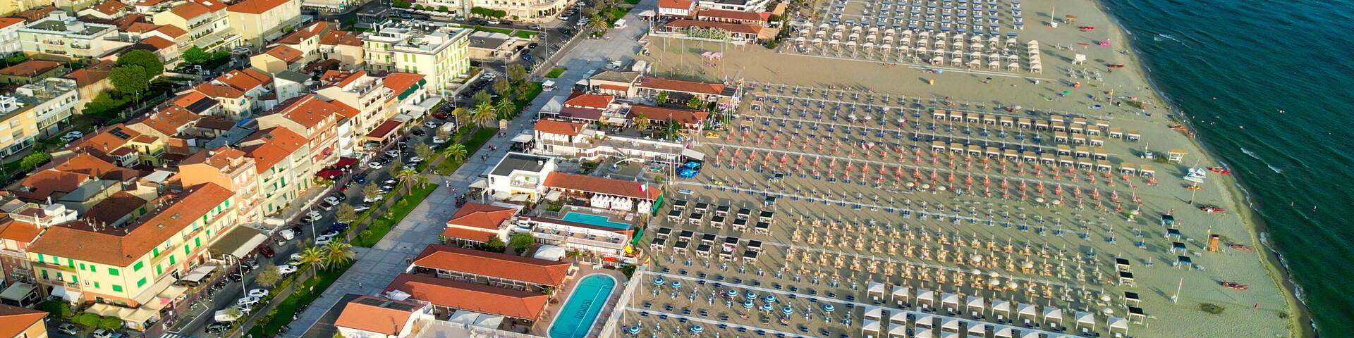 Panoramic aerial view of Lido di Camaiore and Viareggio shoreline in summer season