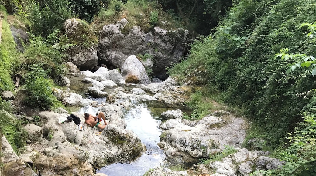 A series of mountain stream pools you can swim in, with derelict mills to photograph. This was taken at the bottom, where the local kids challenge each other to jump in from ever higher ledges.
