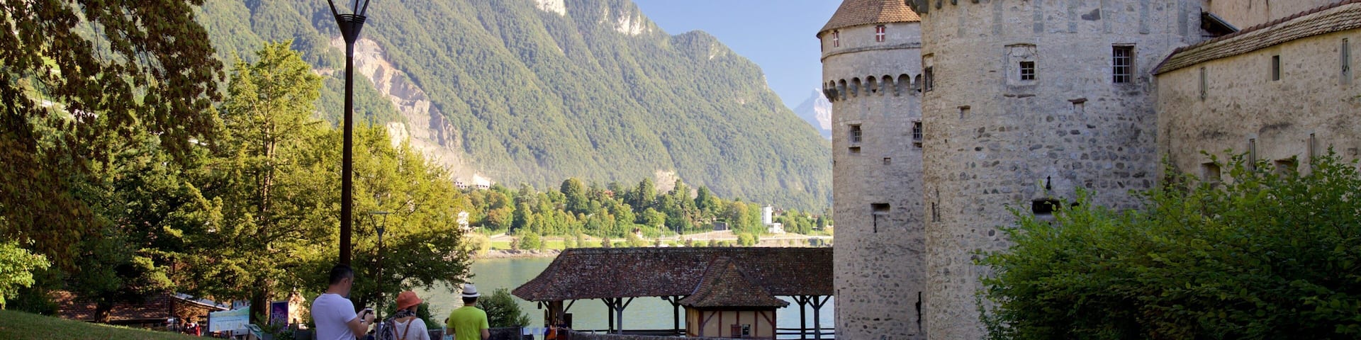 Canton of Vaud featuring heritage architecture and street scenes as well as a small group of people