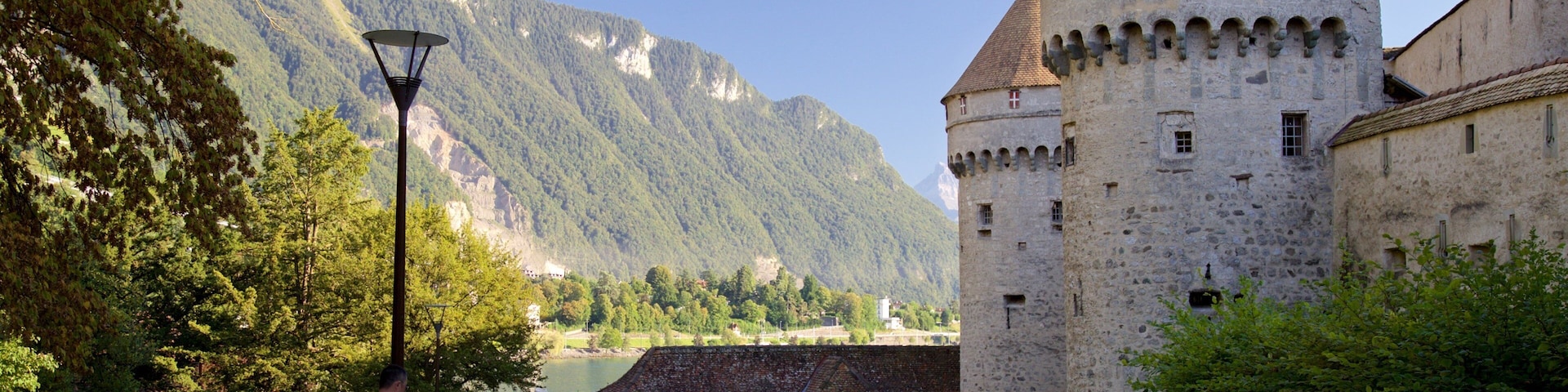 Canton of Vaud featuring heritage architecture and street scenes as well as a small group of people