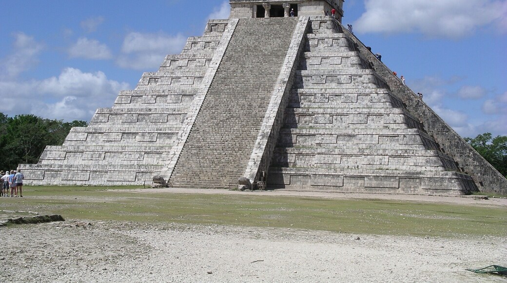 If you go to only one ruin in the Cancun area, I would highly recommend Chichen Itza. It will be an all day excursion but well worth it. Go as early as possible with a reputable and knowledgeable tour company (we used Thomas Moore) and in a small group. We were there in the month of June and arrived mid morning. As we were leaving, the place was starting to get packed with all the larger tour buses and was getting very warm. I have also visited Tulum in June but was disappointed after have already visited Chichen Itza.
I believe that you can no longer climb the well known Kukulkan Pyramid.