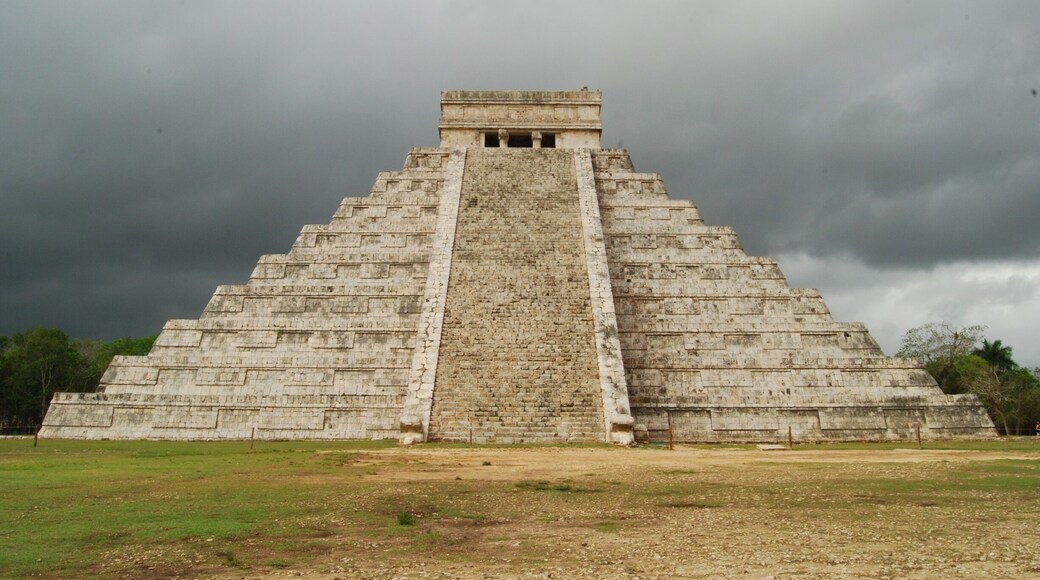 Chichen Itza in Mexico... Mayan ruins are pretty amazing to see, especially with an ominous storm cloud overhead!