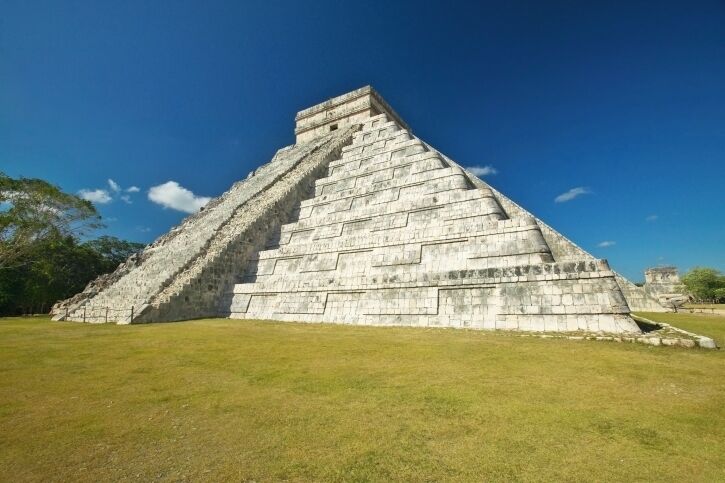 The Mayan Pyramid of Kukulkan (also known as El Castillo) and ruins at Chichen Itza, Yucatan Peninsula, Mexico