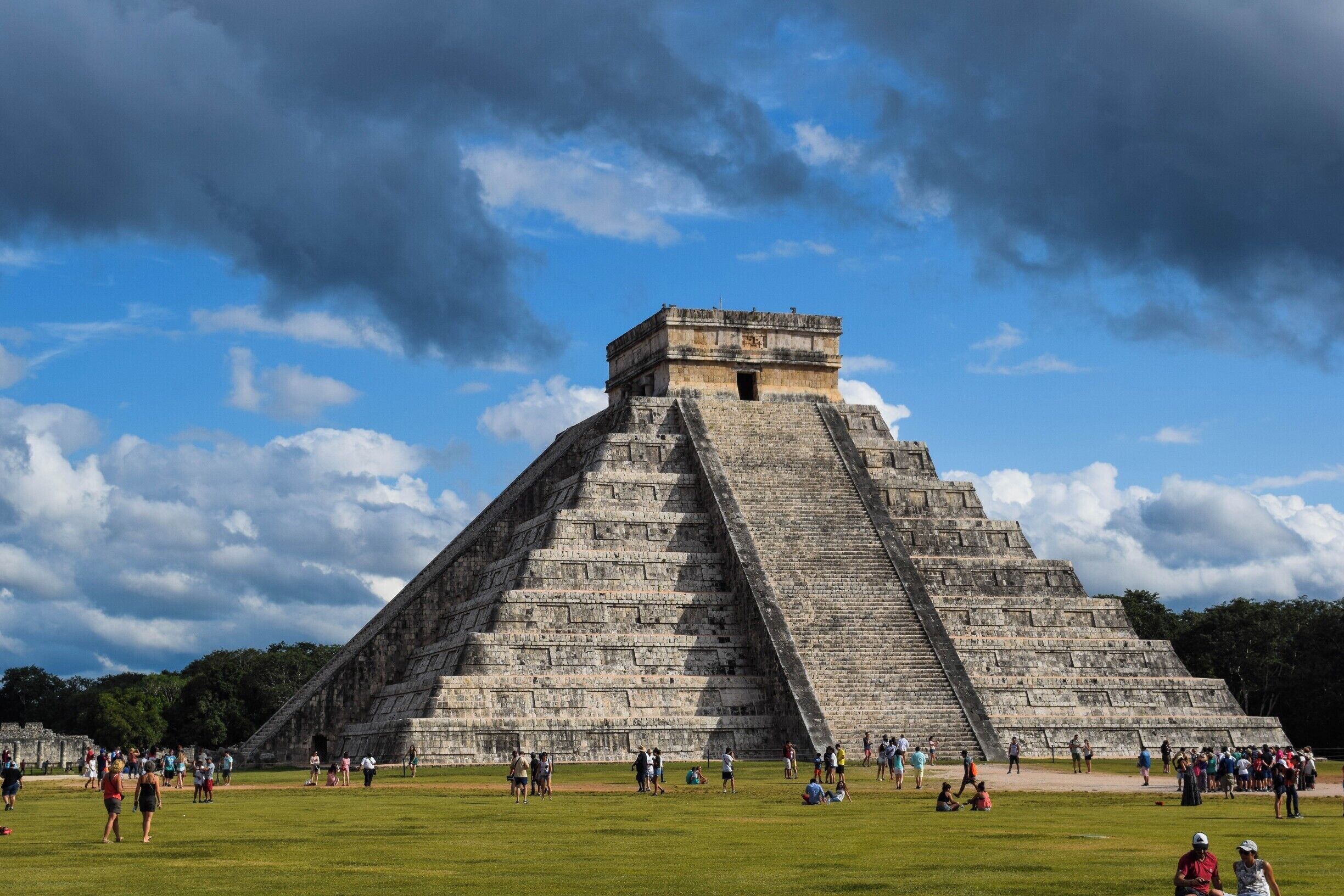 I was super excited to get to see this in person. The site is so much more than this singular temple. Behind where I was standing is a ball court, off to the life is the sacrificial cenote or sinkhole, and behind this temple there is another structure. 