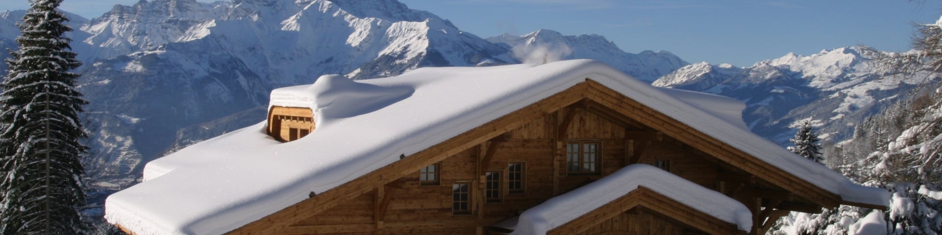 Villars showing a luxury hotel or resort and snow