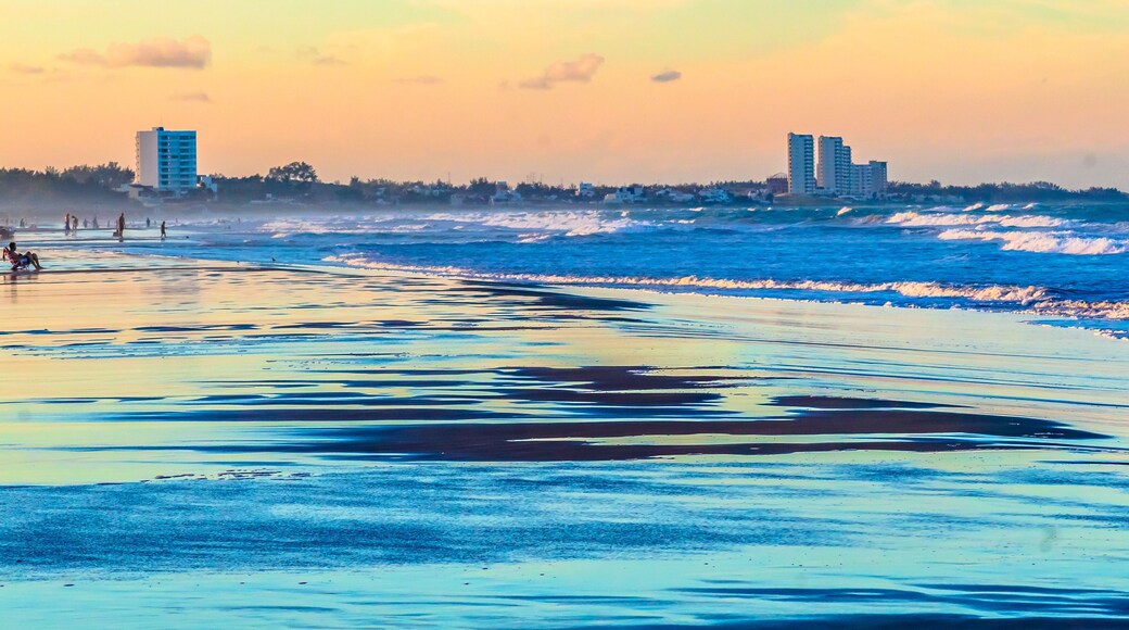 Beach at sunset with buildings in the background at Miramar Beach in Tampico Madero Tamaulipas
