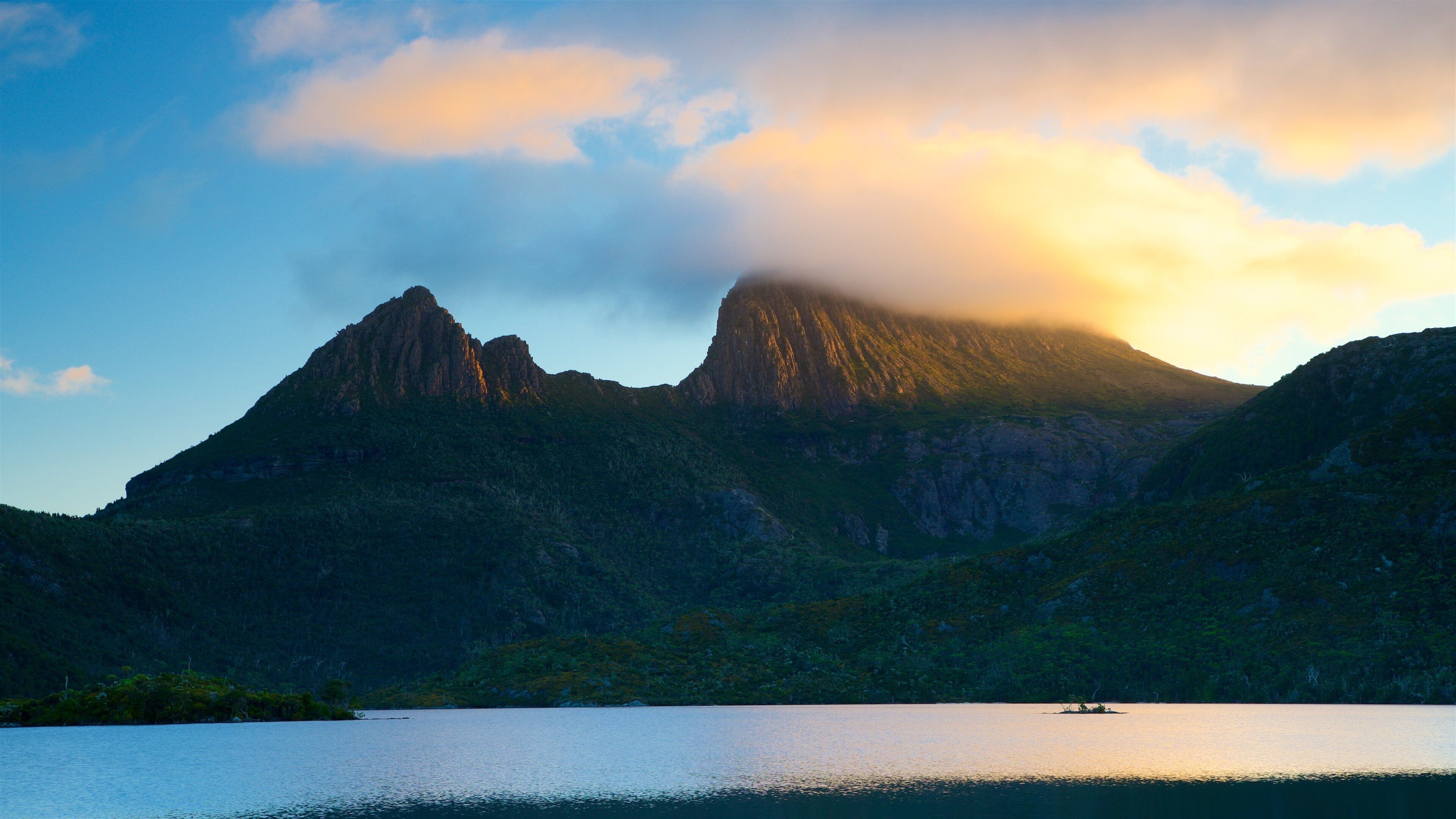 Midlands which includes mountains, a lake or waterhole and a sunset