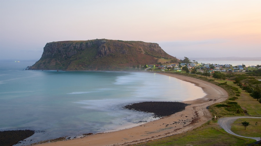 Northwest Tasmania featuring mountains, a sunset and landscape views