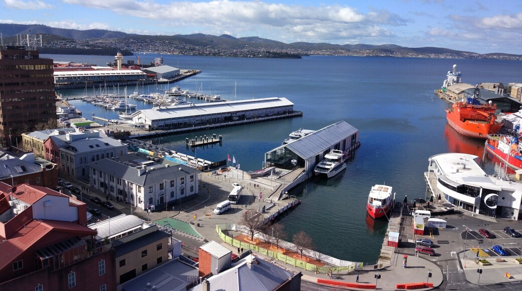 Astonishingly beautiful winter colour seen from an outlook above Hobart's Brooke Street Pier. In this view it is ALL piers. From the RHS, the Antarctic Supply Vessel Aurora Australis shines orange, and small harbour cruise boats are lined up along Waterman's Dock and Brooke St Pier itself. Further over Elizabeth Street Pier - with a hotel in the upper level of a redeveloped former wharf shed, looks over the King's Pier small boat and yacht anchorage. Last and to the distant left, the Port Control Tower stands over a tie up for the many cruise liners which visit Hobart in season. #hobart #tasmania #discovertasmania #xiaomi #xiaomilife #xiaomiMi5 #MI5 #nofilter