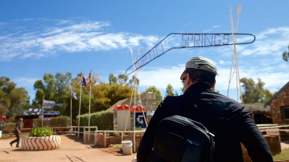 Red Centre which includes tranquil scenes and signage as well as an individual male