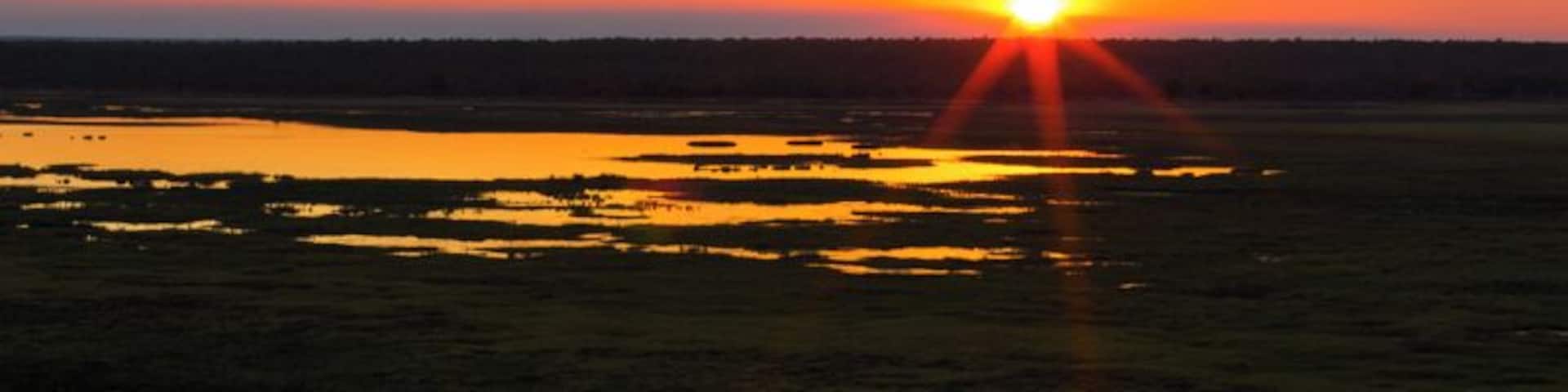 One of the best places to see the sunset in Kakadu National Park is from Ubirr.
Drive to Ubirr and then there's a short climb up an escarpment, just follow the crowd, then sit back and enjoy the view over the plains and the wetlands.