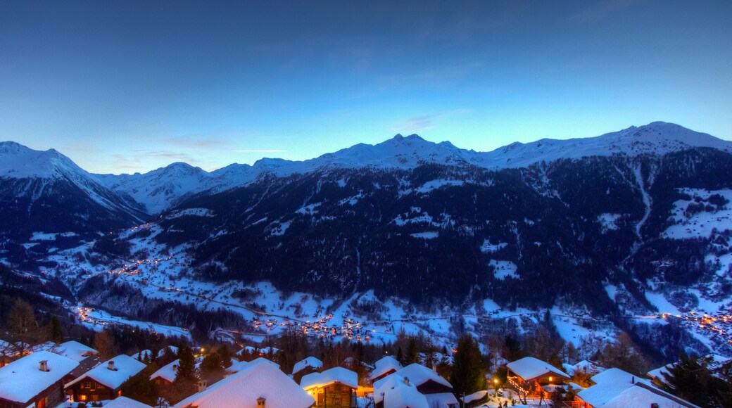 Panoramic view of the Val d'Anniviers at dusk, view from the village of St Luc. Canton of Valais, Switzerland