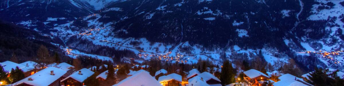 Panoramic view of the Val d'Anniviers at dusk, view from the village of St Luc. Canton of Valais, Switzerland