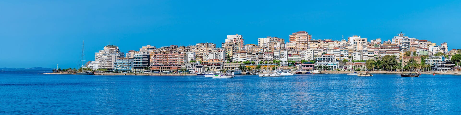 A view towards the far side of the bay at Sarande in the morning in summertime