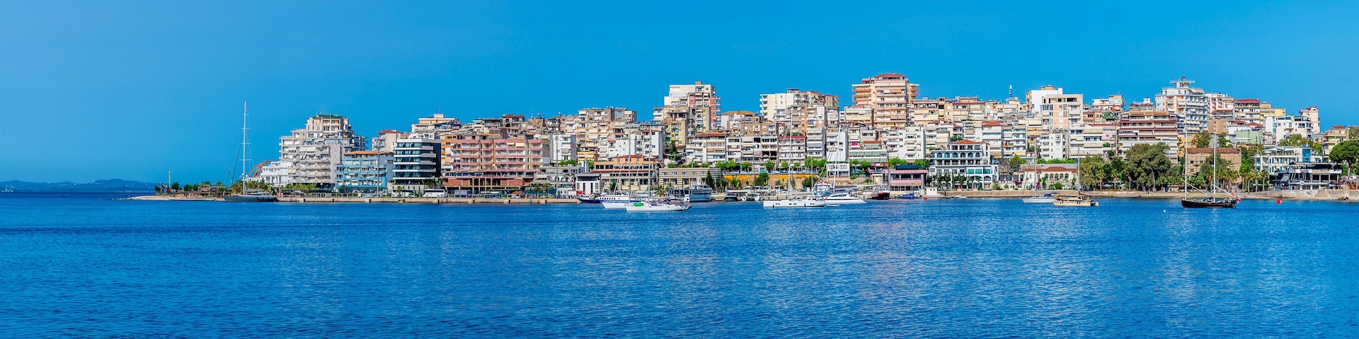 A view towards the far side of the bay at Sarande in the morning in summertime