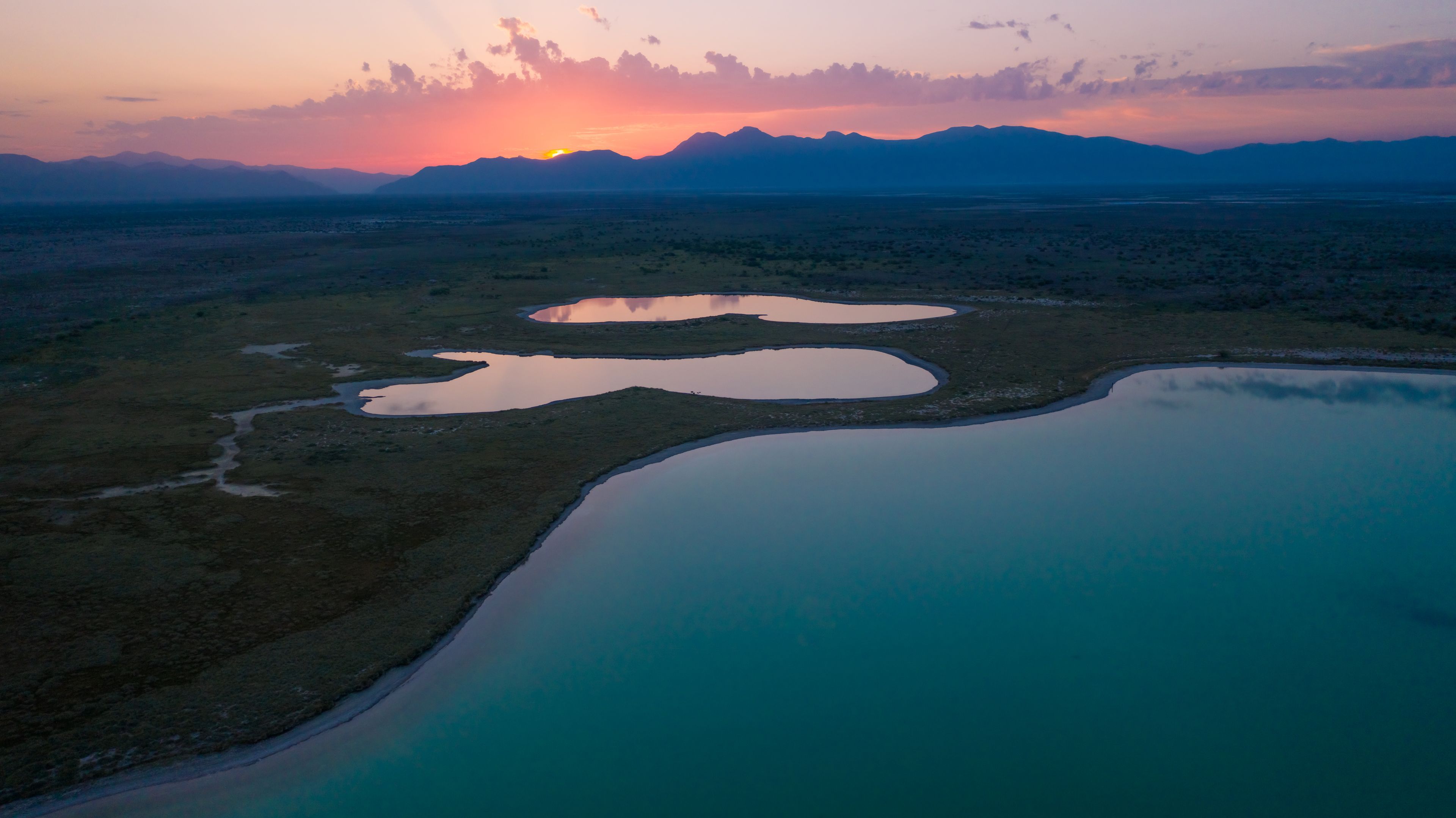 Aerial view of the turquoise pools of Cuatrocienegas Basin in the desert landscape of Cuatrocienegas Municipality, Coahuila, Mexico.