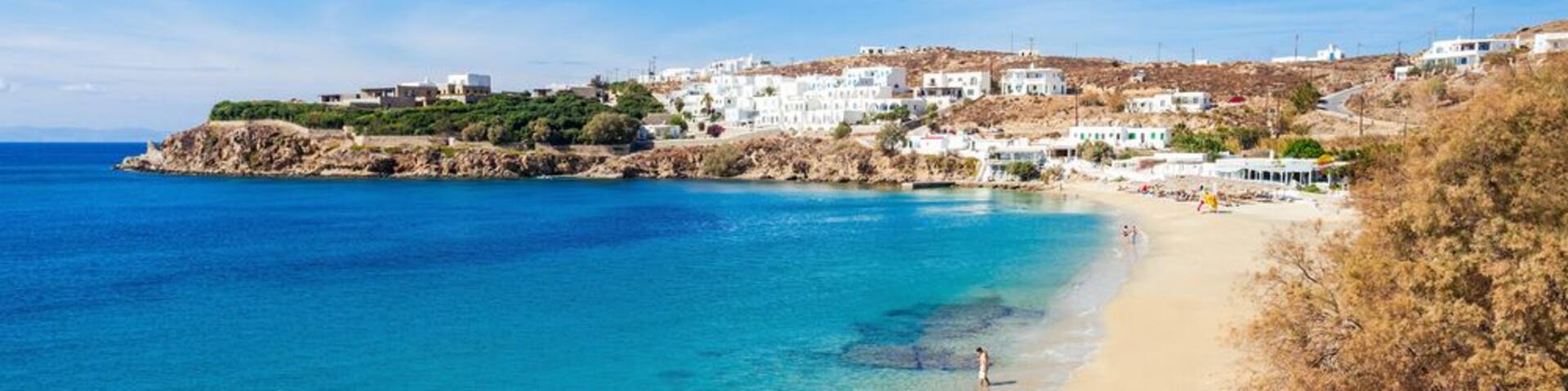 Agios Stefanos Beach on the Mykonos island, Cyclades in Greece.; Shutterstock ID 572575390; PO: Hcom Destination Content neighborhoods; Client: Hotels.com; Other: Hcom brand budge