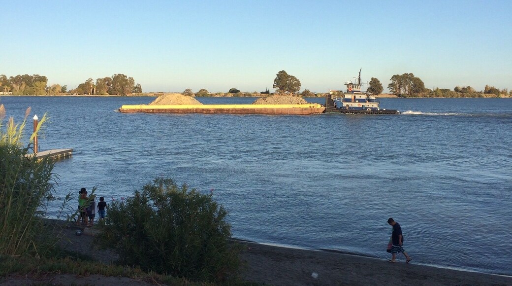 Gravel barge going down the river