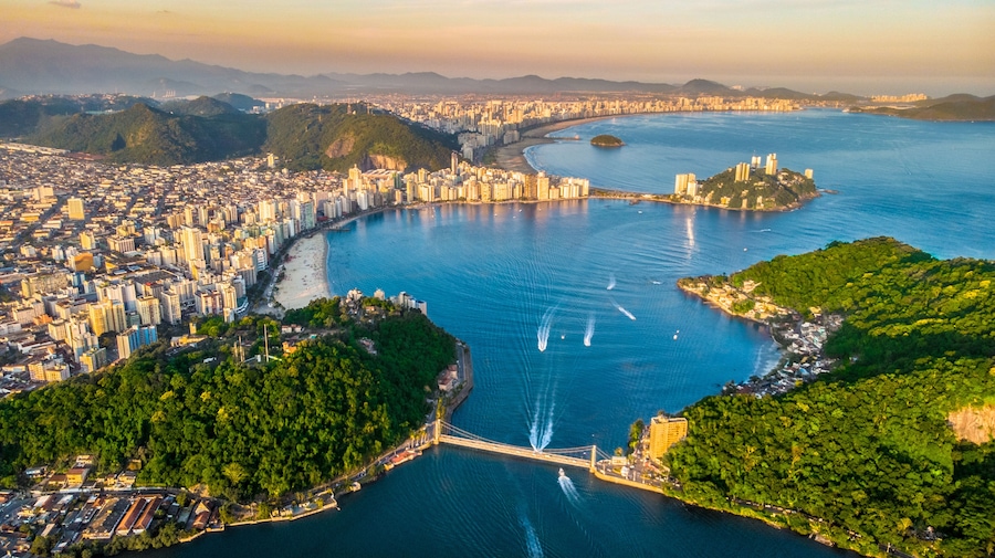 View of drone from the bay of São Vicente with Santos to the bottom in the state of São Paulo - Brazil.