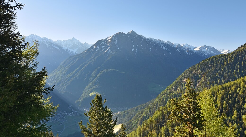 Oetztal valley with the village Laengenfeld and Stubai Alps in the morning. Tirol, Austria.