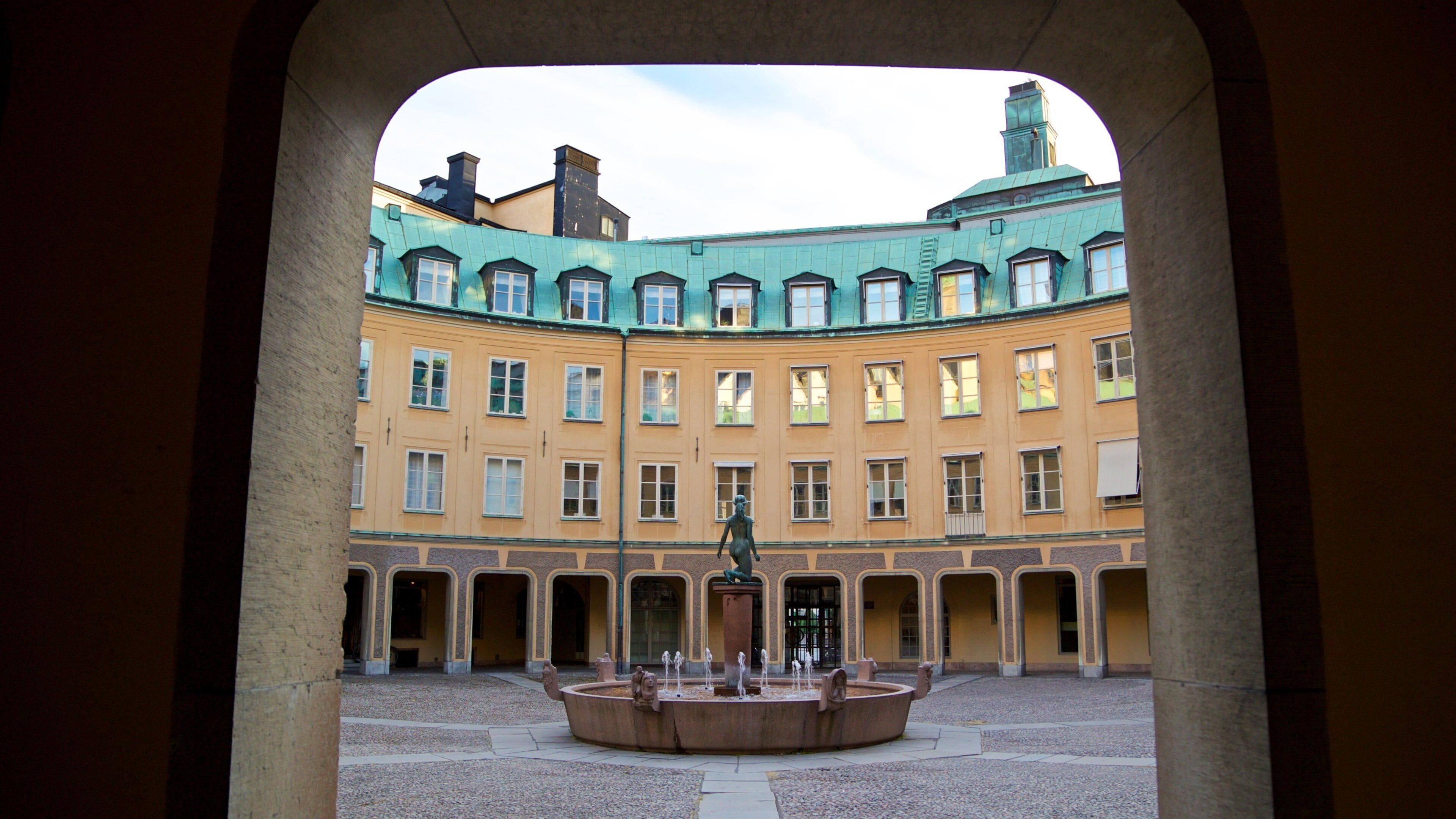 Gamla Stan featuring a fountain