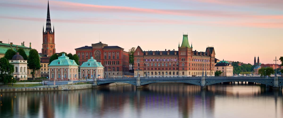 Gamla Stan which includes a bridge, a city and a river or creek