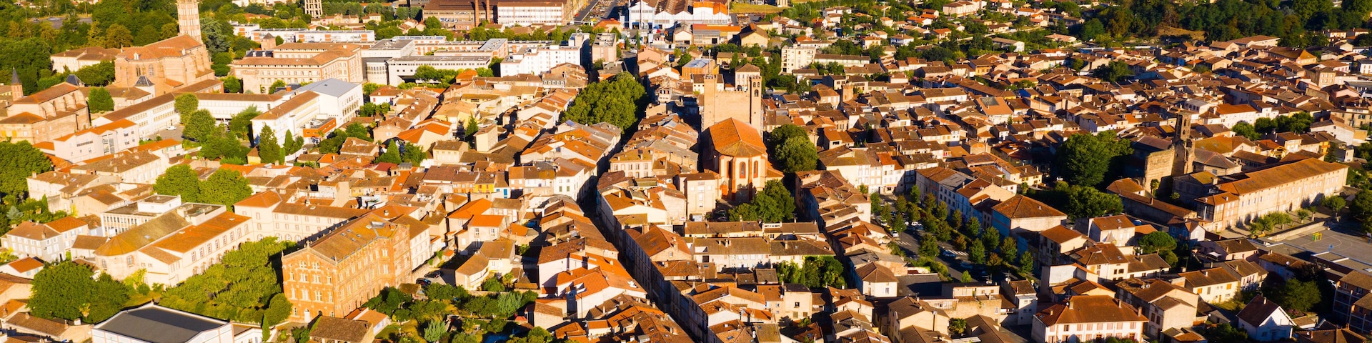 Panoramic aerial view of Pamiers cityscape with buildings, located on the river Ariege, France