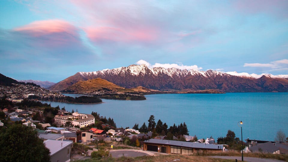 Fernhill which includes mountains, a small town or village and a lake or waterhole