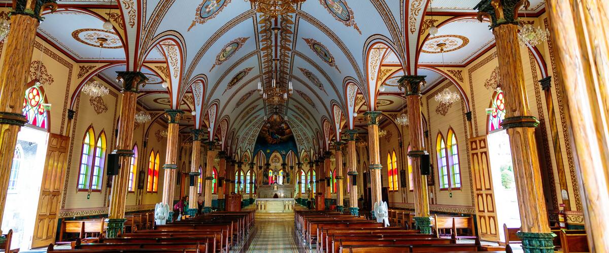 San Pablo, Costa Rica - April 3, 2017: Church of Archangel Gabriel and sculpted gardens of San Rafael de Heredia Park