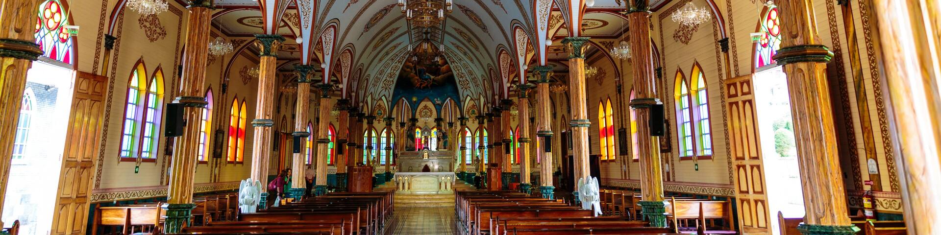 San Pablo, Costa Rica - April 3, 2017: Church of Archangel Gabriel and sculpted gardens of San Rafael de Heredia Park