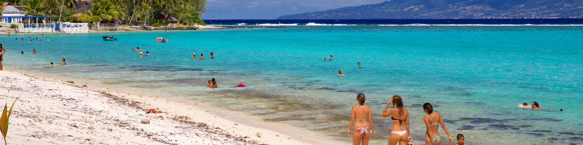 Temae Beach showing a sandy beach, tropical scenes and general coastal views