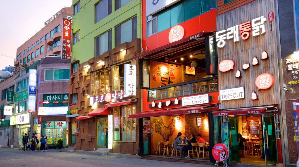 Haeundae showing a city and signage