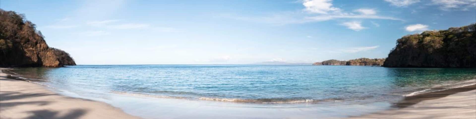 North Pacific Coast which includes a beach and landscape views