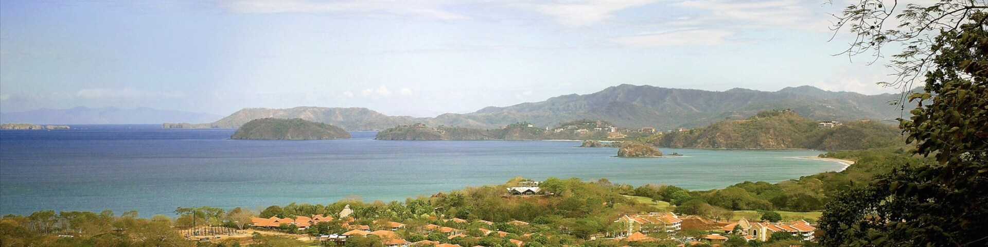 Guanacaste - North Pacific Coast showing landscape views, general coastal views and a coastal town