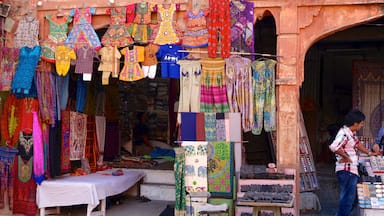 Jaipur featuring markets and a city as well as an individual male