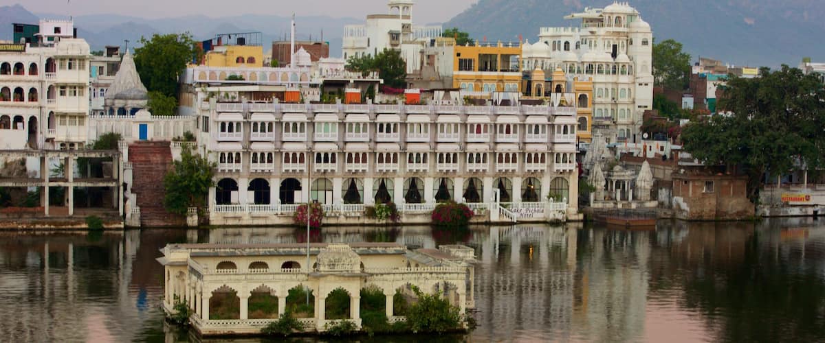 Udaipur featuring a city and a lake or waterhole