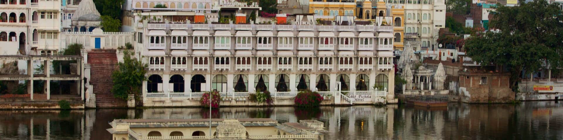 Udaipur featuring a city and a lake or waterhole