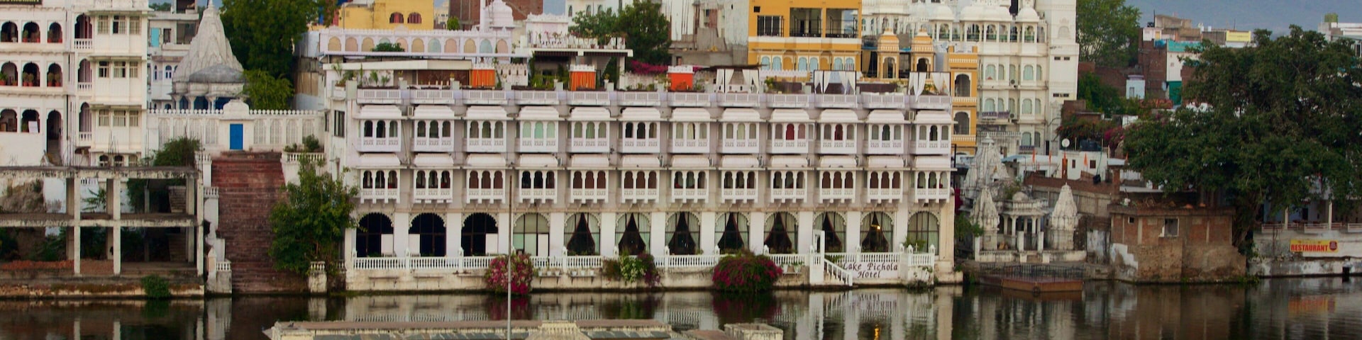 Udaipur featuring a city and a lake or waterhole