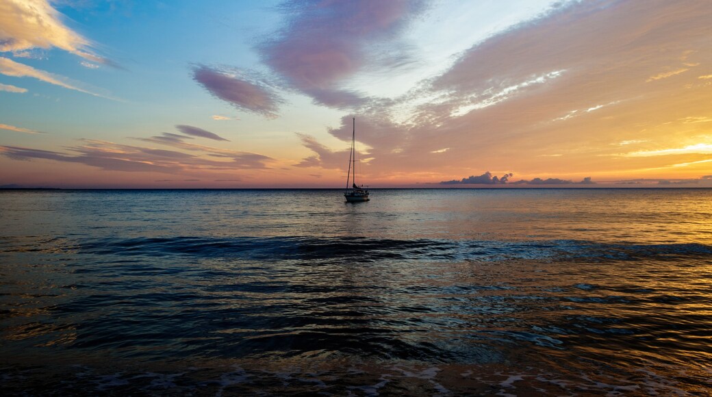 Sailing boath during sunrise on an early morning at the Solanzara beach on the island of corsica.